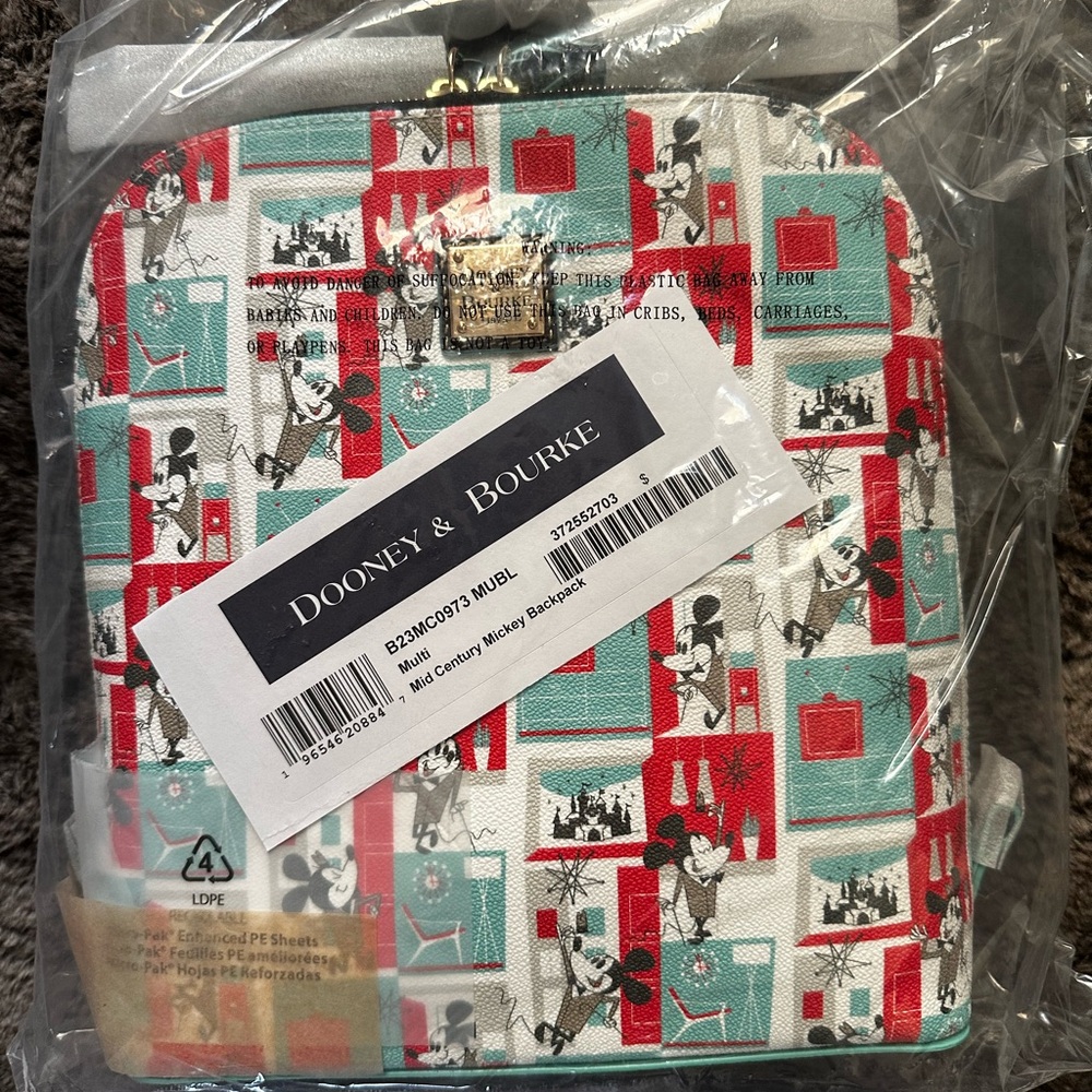 Disney mid century modern Dooney & Burke backpacks